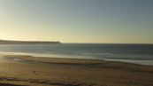 SX00654 Walker on Tramore beach Brownstown head.jpg